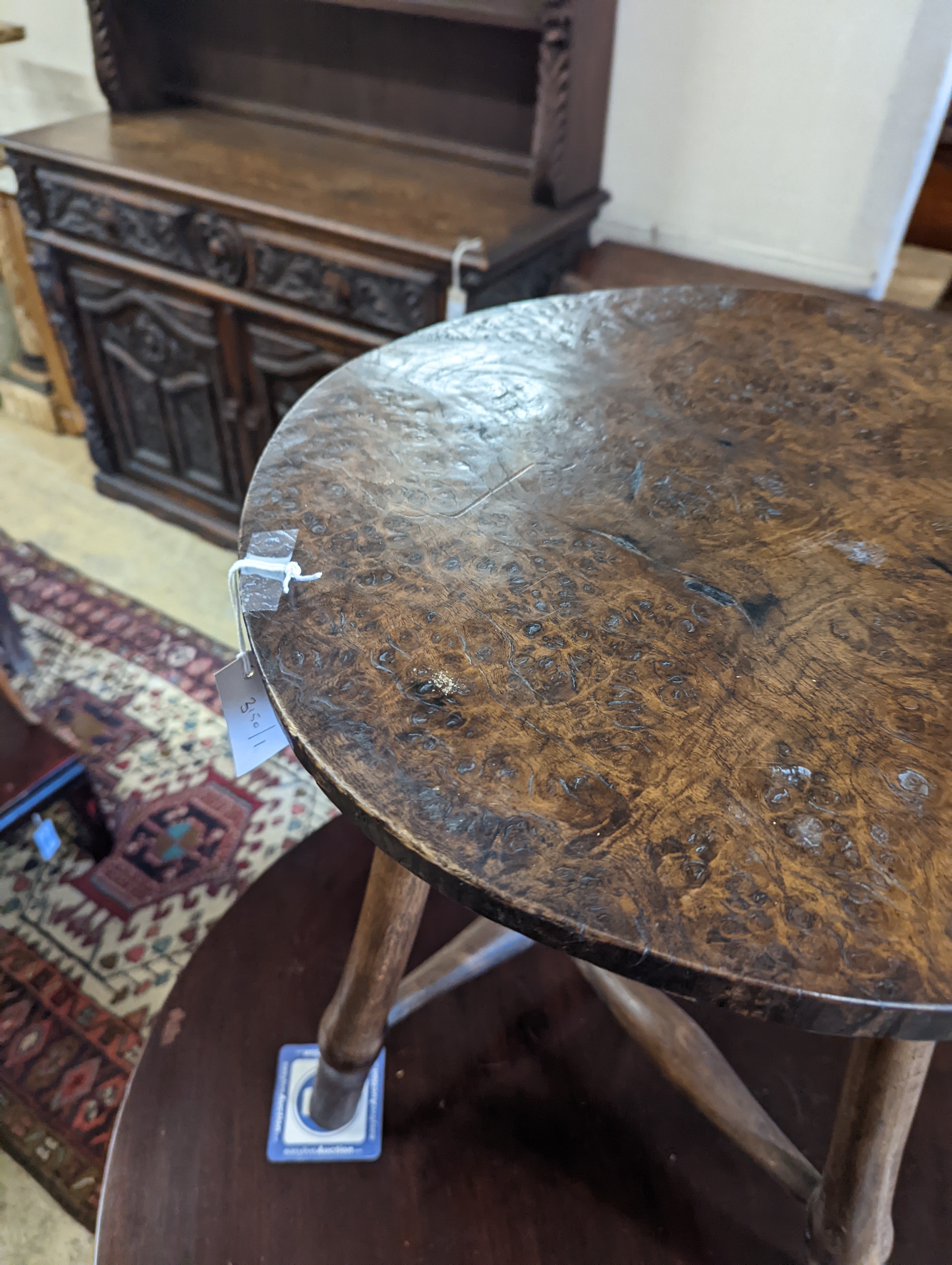 A late 18th / early 19th century circular burr elm and ash cricket table, diameter 60cm, height 62cm